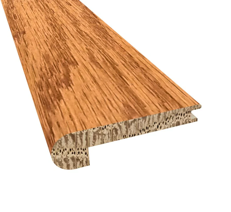 1001-prefinished-butterscotch-oak-3-8-in.-thick-x-2.75-in.-wide-x-6.5-ft.-length-stair-nose-1.webp Prefinished Butterscotch Oak 3/8 in. Thick x 2.75 in. Wide x 6.5 ft. Length Stair Nose