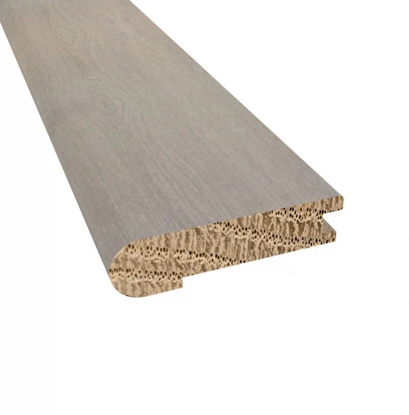 1979-prefinished-barcelona-white-oak-5-8-in.-thick-x-2.75-in.-wide-x-6.5-ft.-length-stair-nose-1.webp Prefinished Barcelona White Oak 5/8 in. Thick x 2.75 in. Wide x 6.5 ft. Length Stair Nose