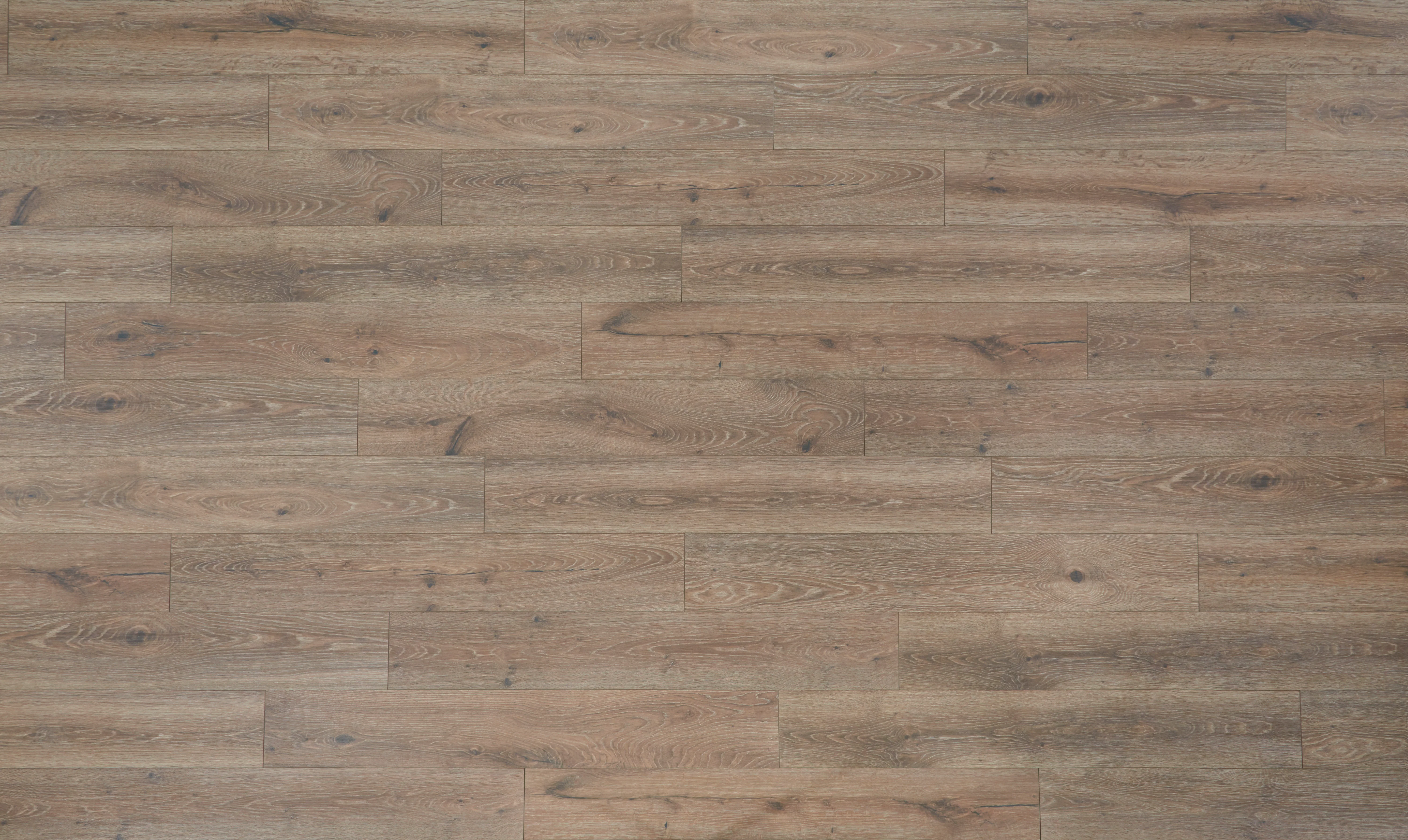 2034-9mm-w-pad-sagrada-bridge-oak-water-resistant-hybrid-resilient-flooring-7.6-in.-wide-x-50.63-in.-long-3.webp 9mm w/pad Sagrada Bridge Oak Water-Resistant Hybrid Resilient Flooring 7.6 in. Wide x 50.63 in. Long
